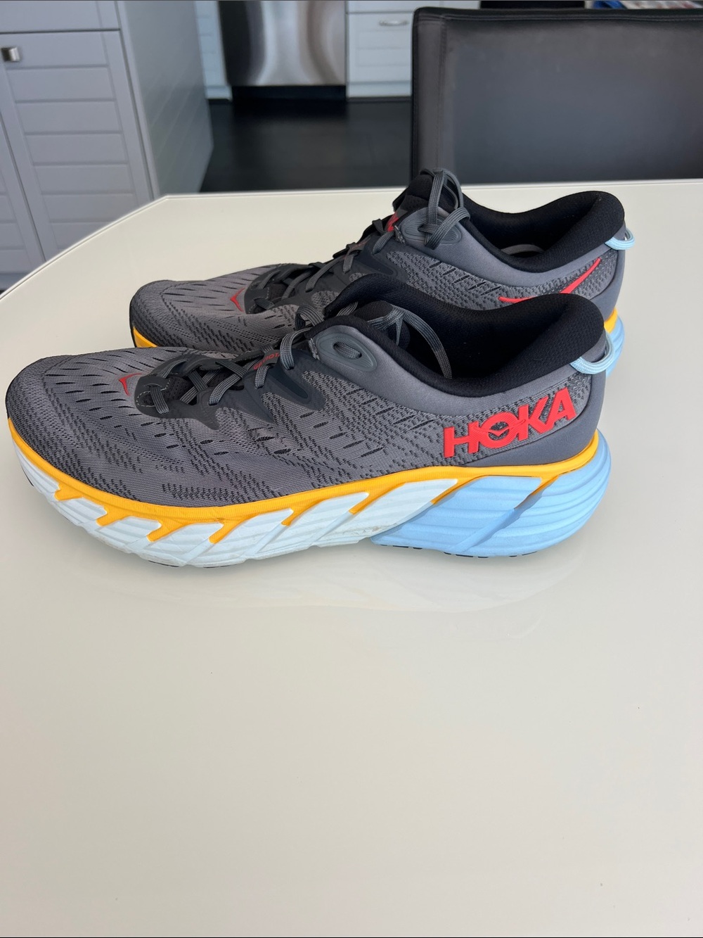 Hoka Men's Gray Athletic Shoes with Yellow & Light Blue Accents